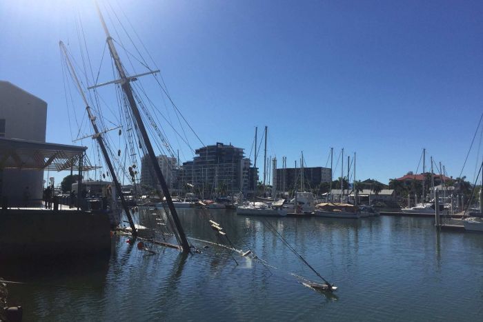Vandalism suspected as historic tall ship Defender sinks in Townsville